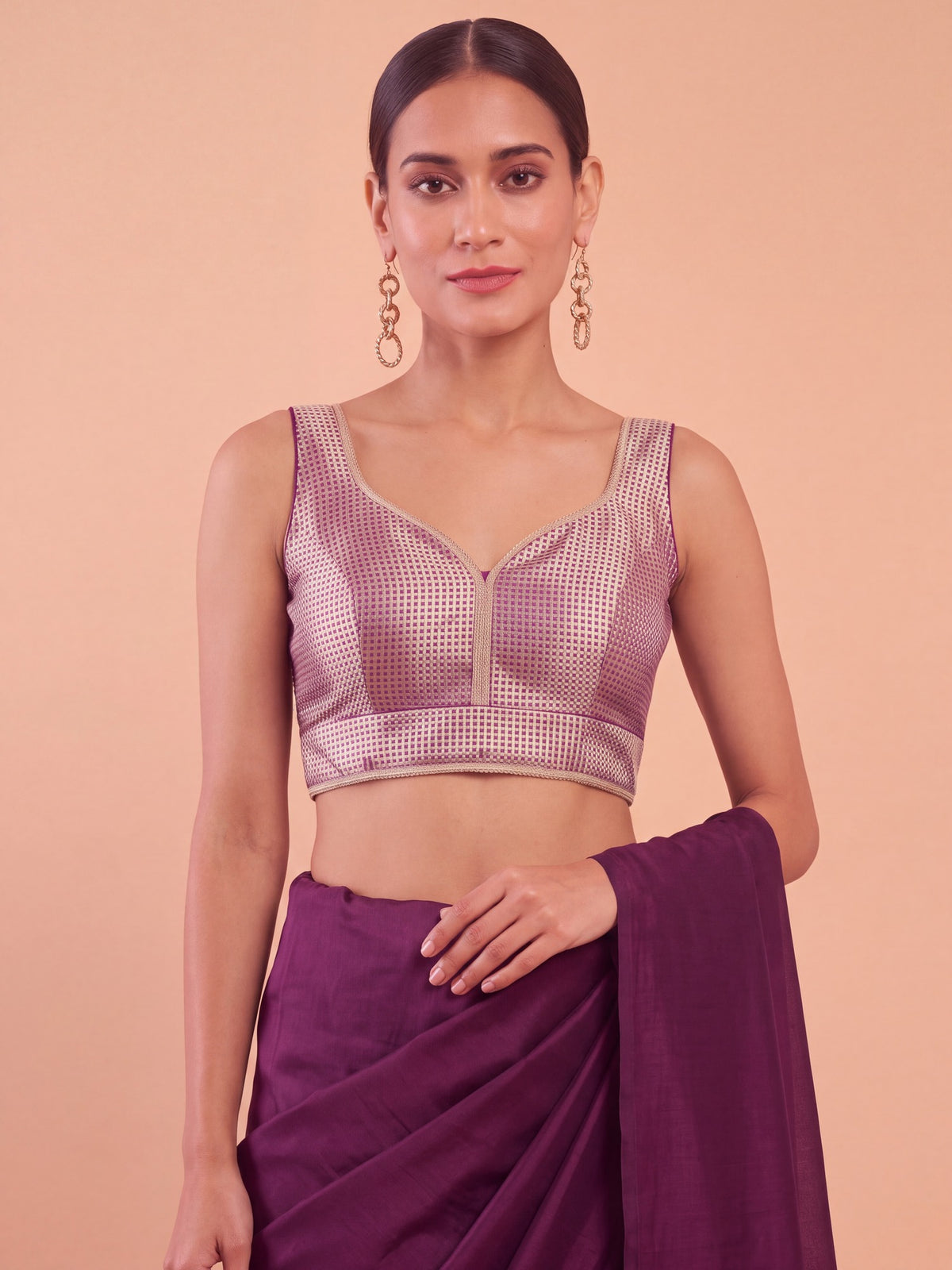 Maroon woven metallic jacquard sleeveless readymade saree blouse with sweetheart neck