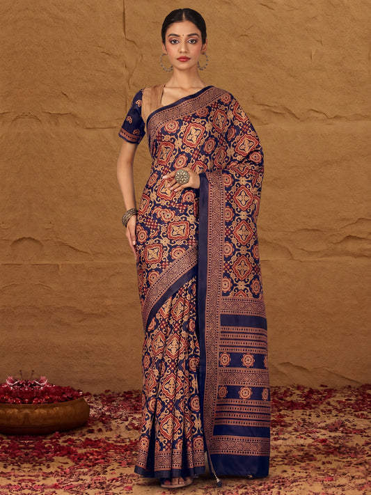 Woman wearing navy blue silk blend saree with ajrak block-print motif work and taupe blouse