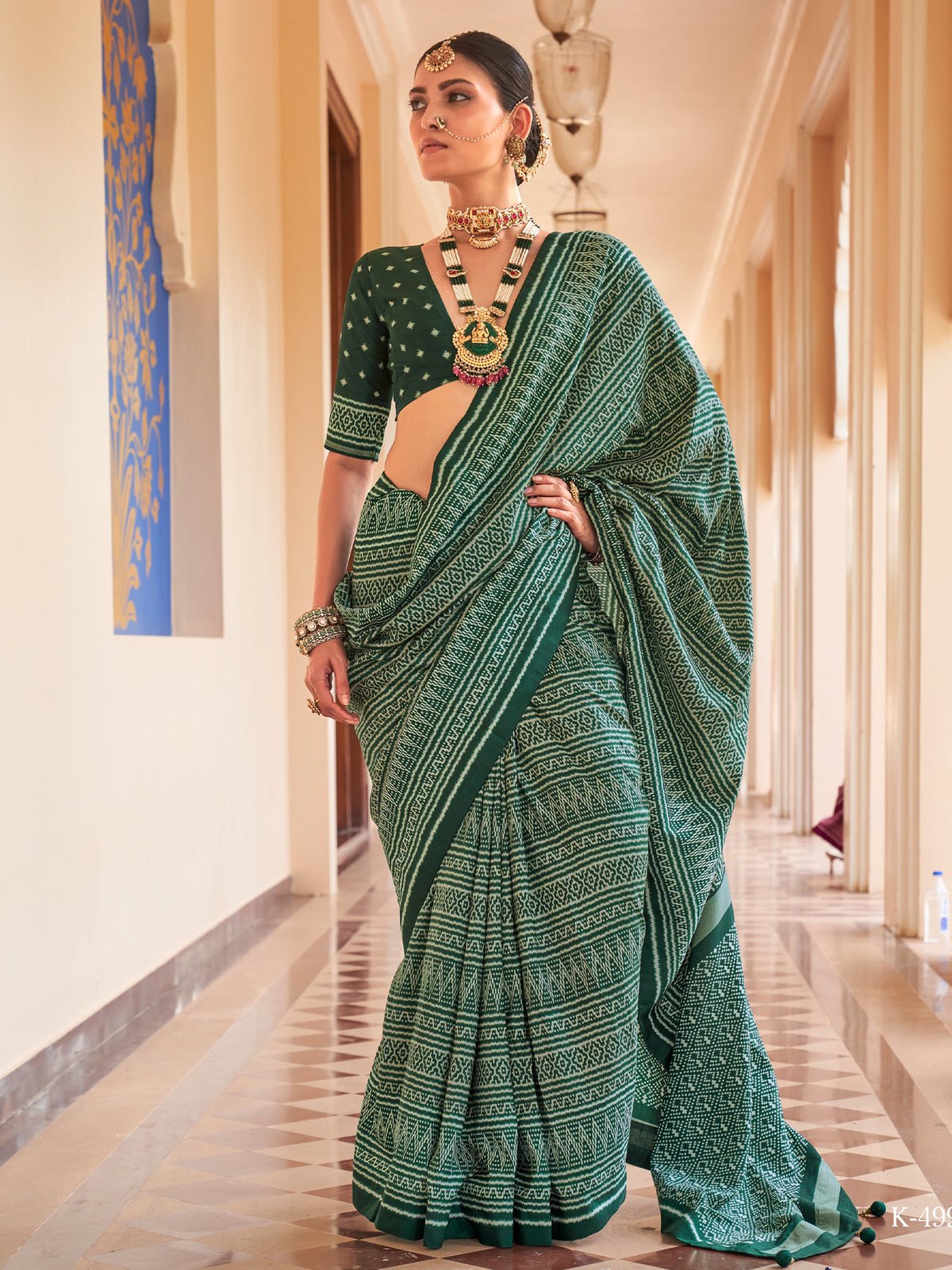 Green geometric silk blend saree with green blouse piece