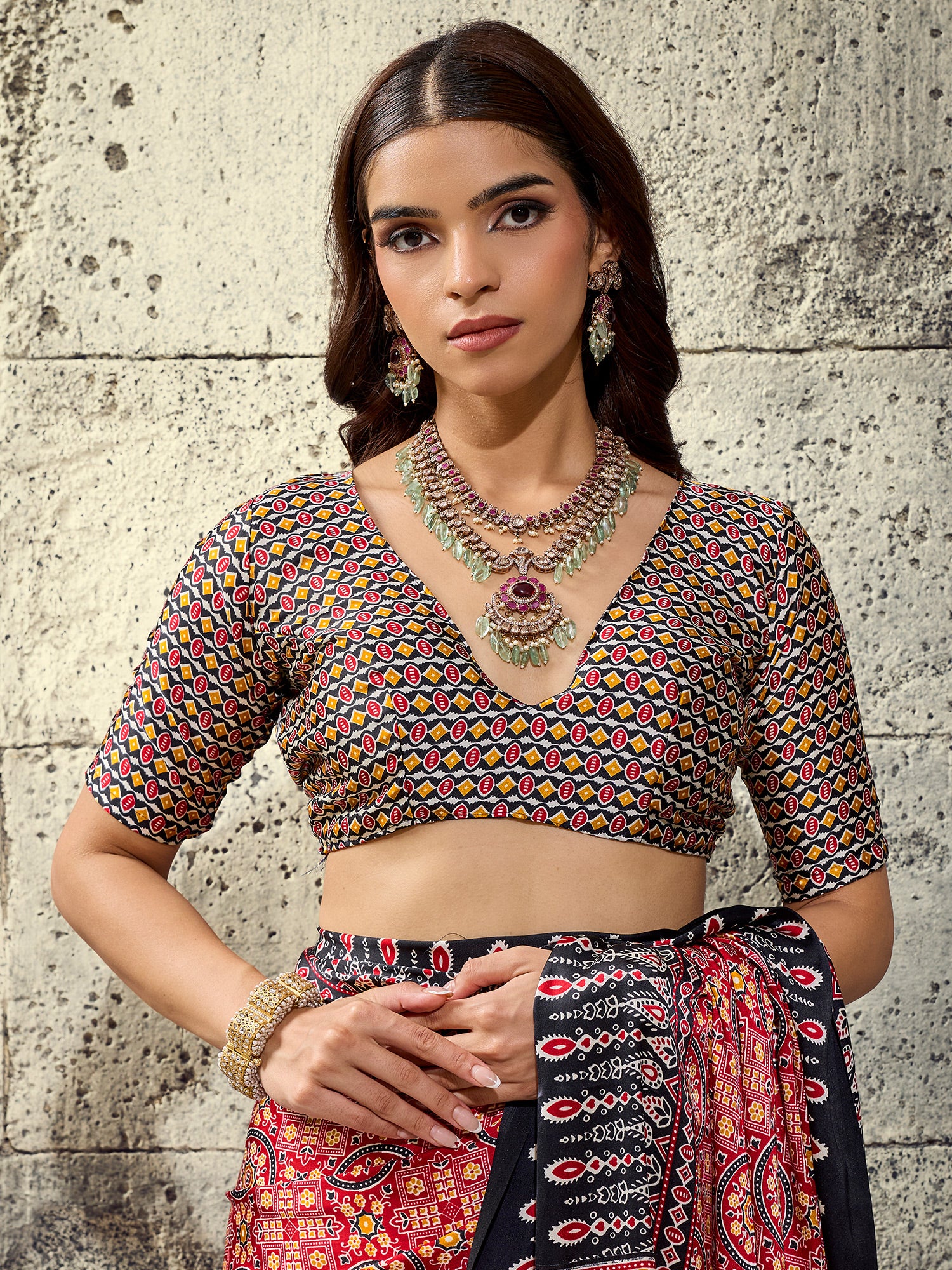 Unstitched black satin blouse piece with ajrak design