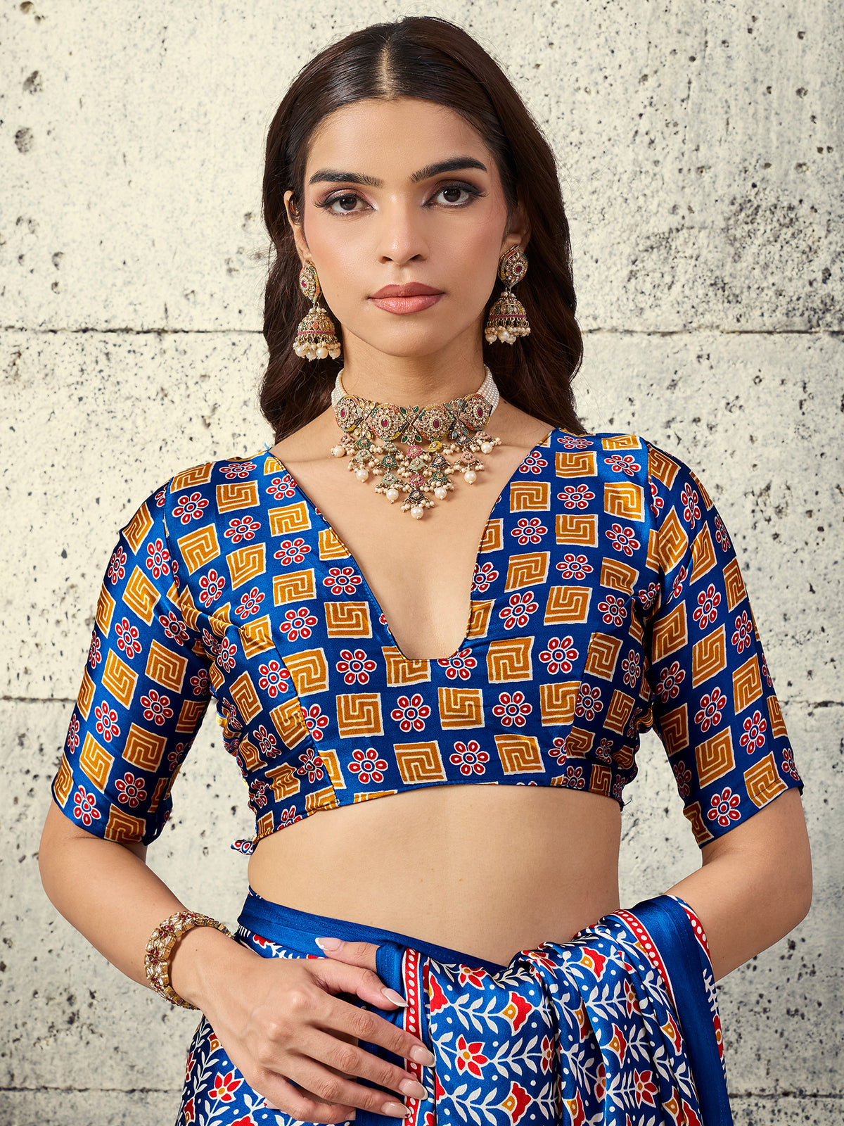 Unstitched blue satin blouse piece with ajrak design