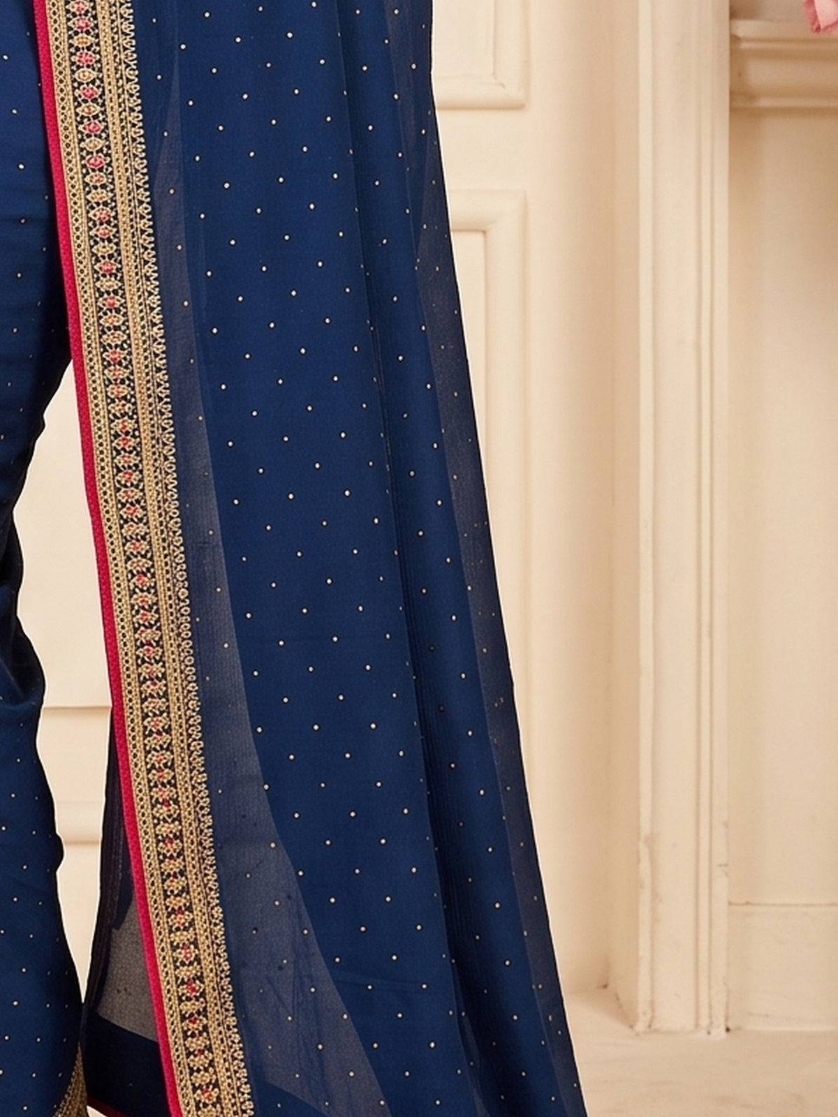 Pallu detail of teal blue vichitra silk saree showing ornamented surface design and embellished border