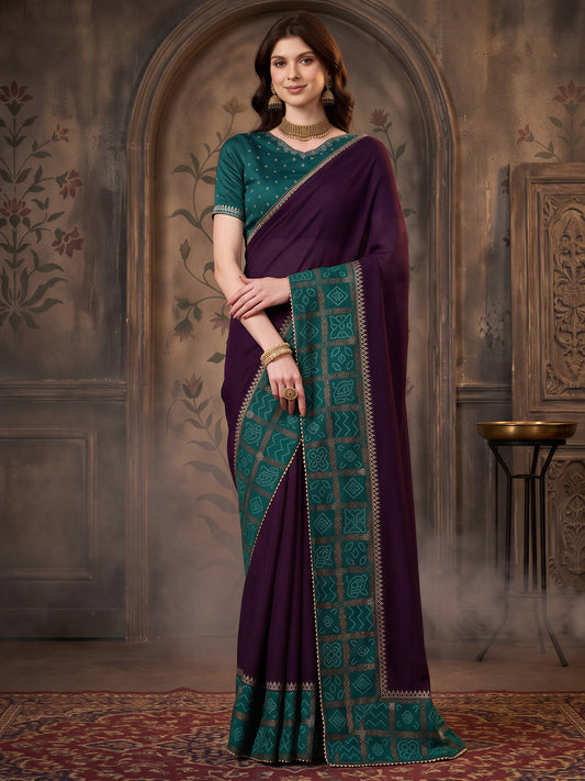 Woman wearing purple vichitra silk saree with bandhani tie-dye dot work and teal blue blouse