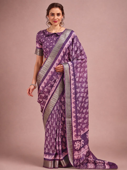 Woman wearing violet cotton silk saree with traditional indian motif work and violet blouse