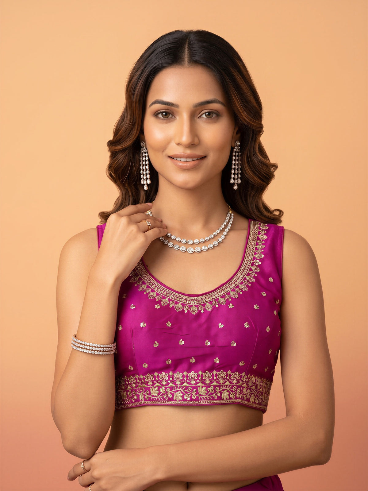 Magenta sequin embellished silk blend sleeveless readymade saree blouse with round neck