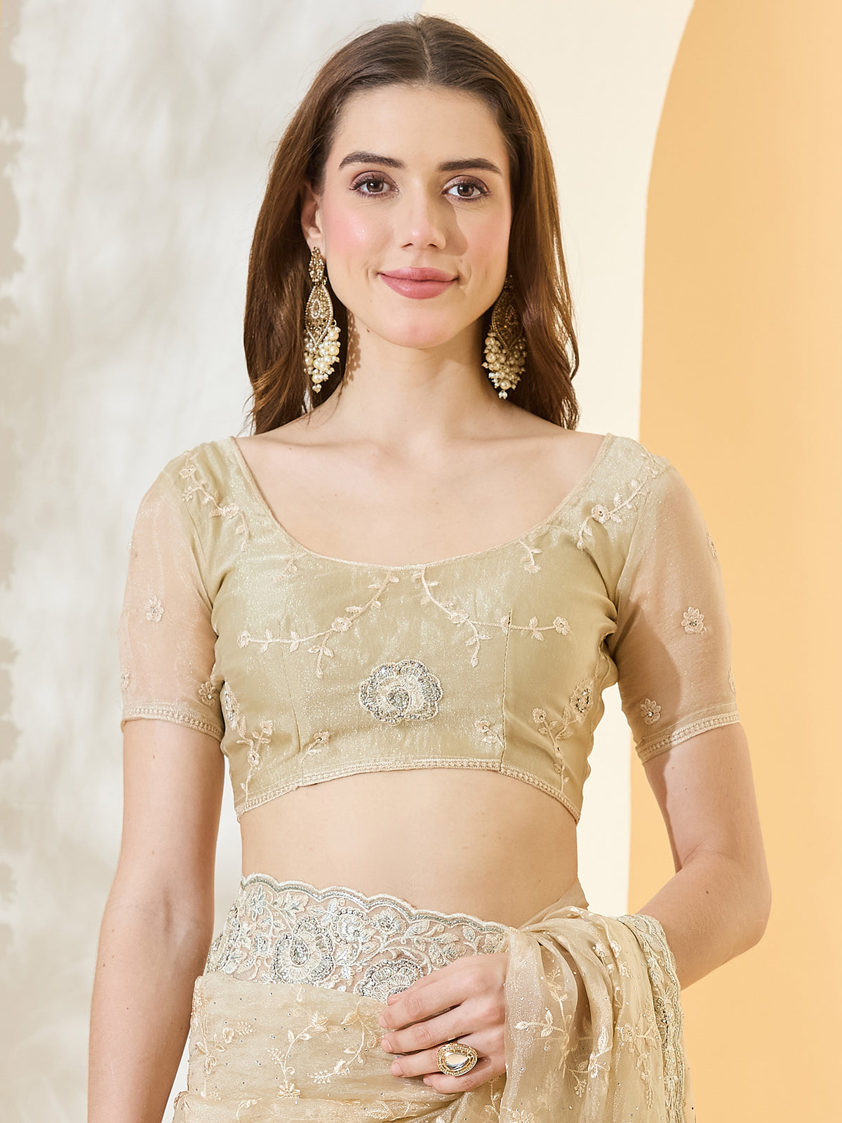 Unstitched beige organza blouse piece with embroidered design