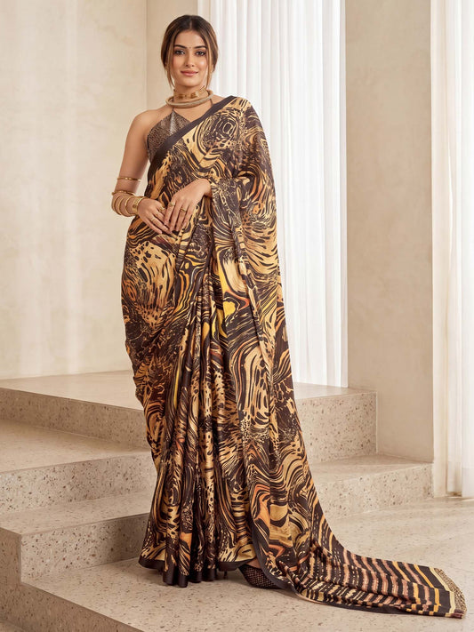 Woman wearing beige crepe saree with abstract contemporary design and black blouse