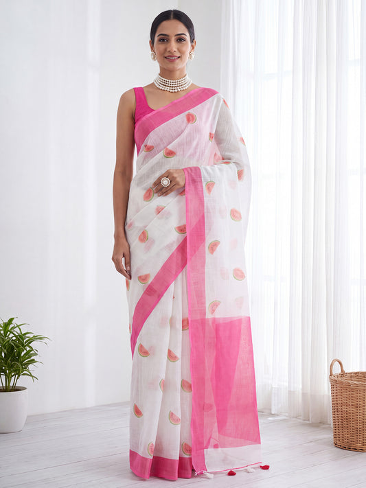 Woman wearing pink cotton linen saree with quirky design and pink blouse