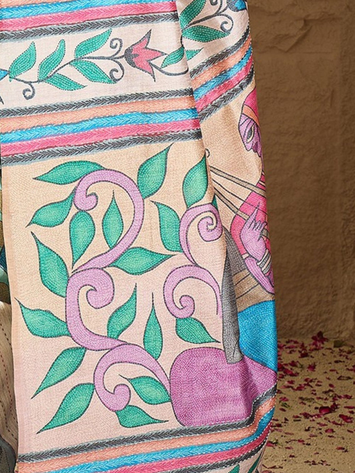 Pallu detail of multicolored art silk saree showing kalamkari narrative motif work and printed border