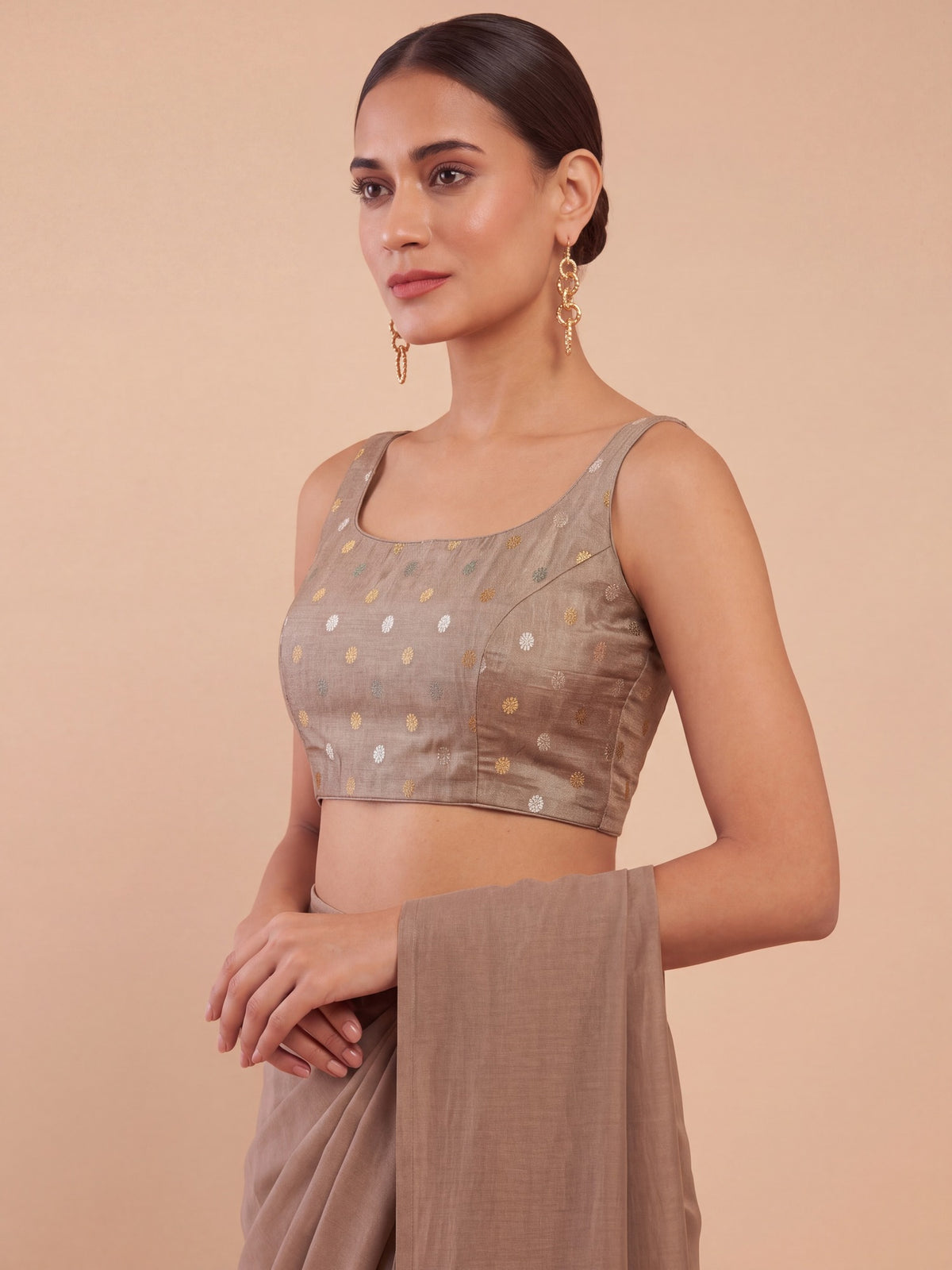 Beige zari woven georgette sleeveless readymade saree blouse with round neck view 1