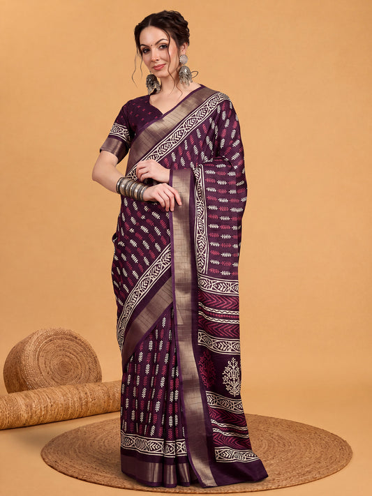 Woman wearing purple silk blend saree with traditional indian motif work and purple blouse