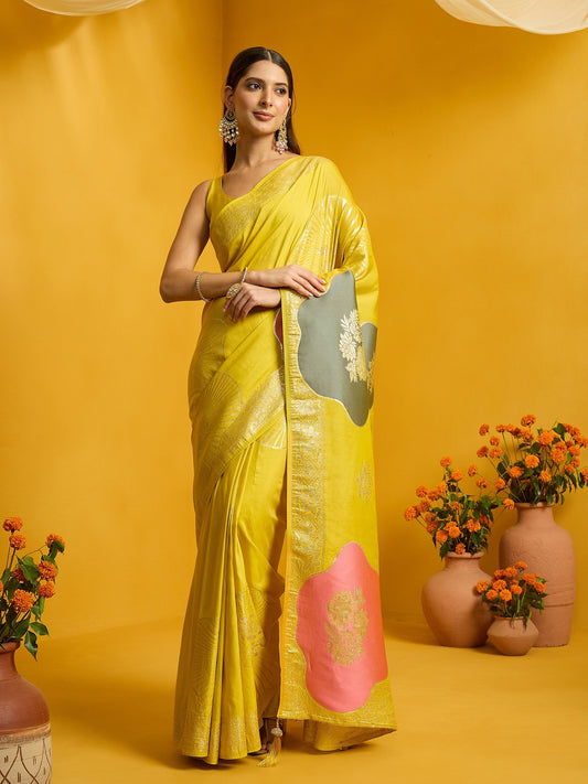 Woman wearing yellow dola silk saree with all-over floral design and yellow blouse