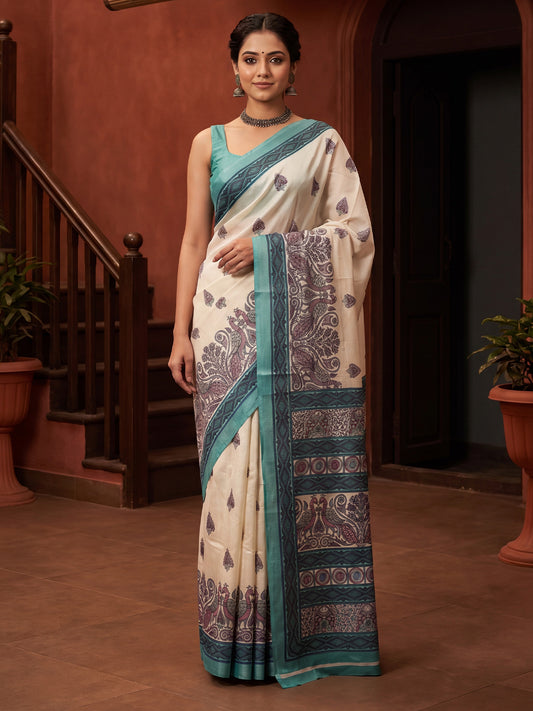 Woman wearing off white bhagalpuri silk saree with kalamkari narrative motif work and turquoise blouse