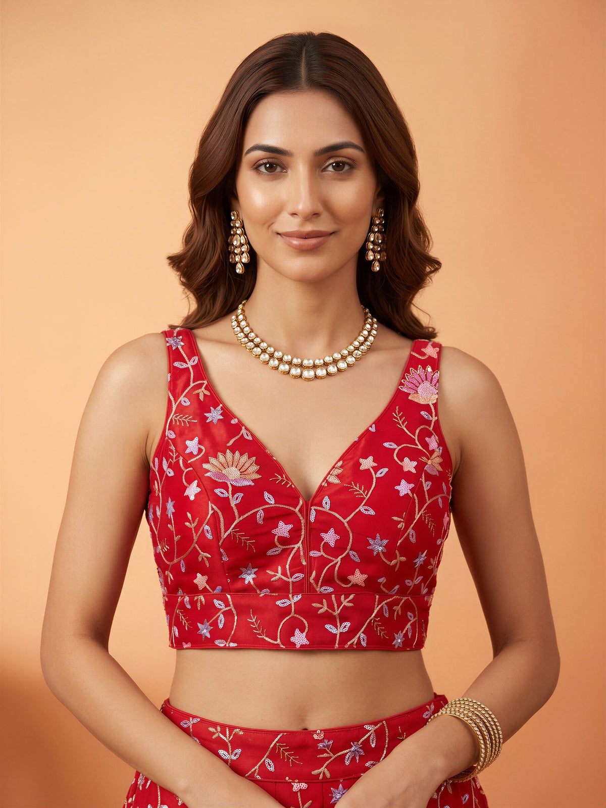Red sequin embellished satin sleeveless readymade saree blouse with deep v neck
