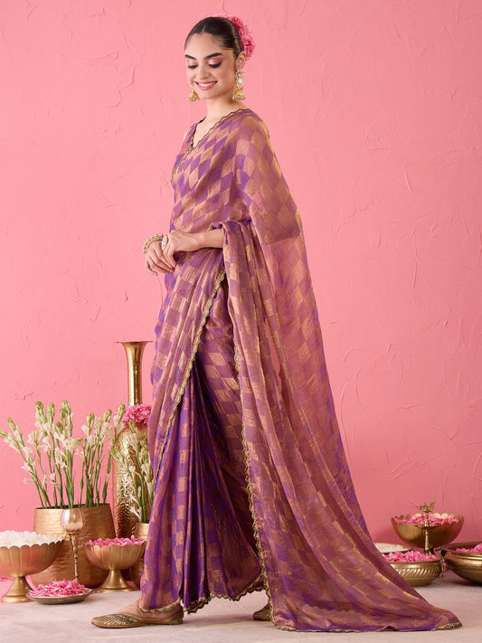 Woman wearing purple chiffon ready to wear saree with checked pattern design and purple blouse