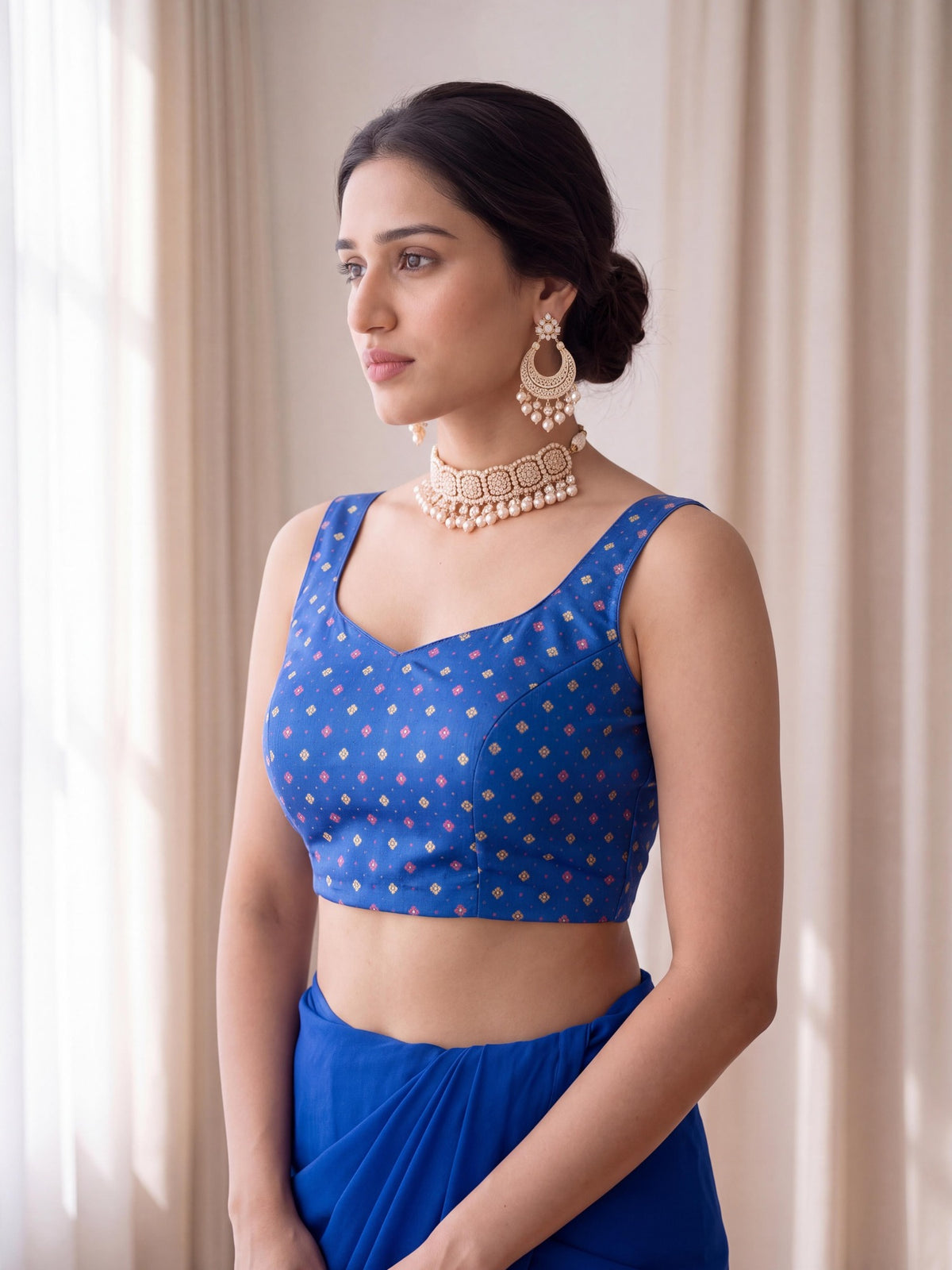 Turquoise Blue zari woven silk blend sleeveless readymade saree blouse with round neck view 3