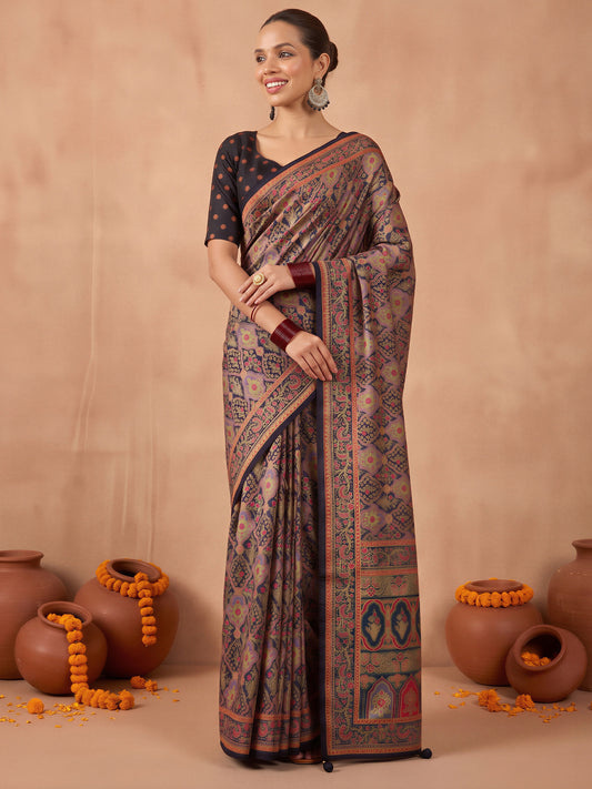 Woman wearing black silk blend saree with metallic foil print work and black blouse