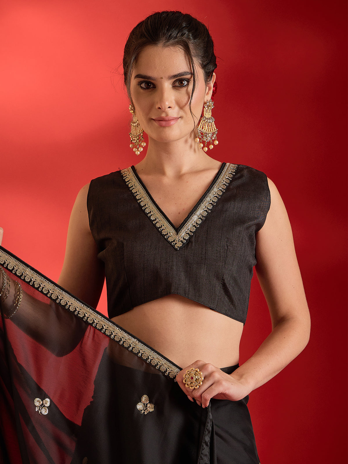 Unstitched black georgette blouse piece with embellished design