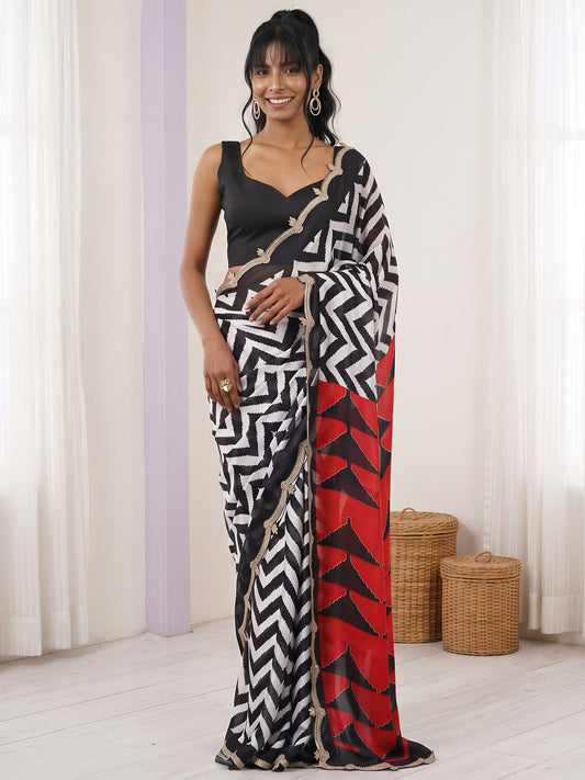Woman wearing white pure georgette saree with striped pattern design and black blouse