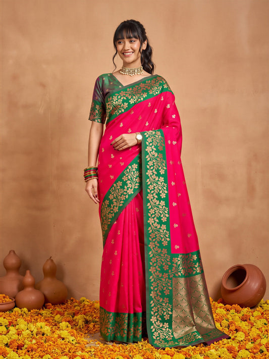 Woman wearing pink cotton blend saree with all-over floral design and green blouse