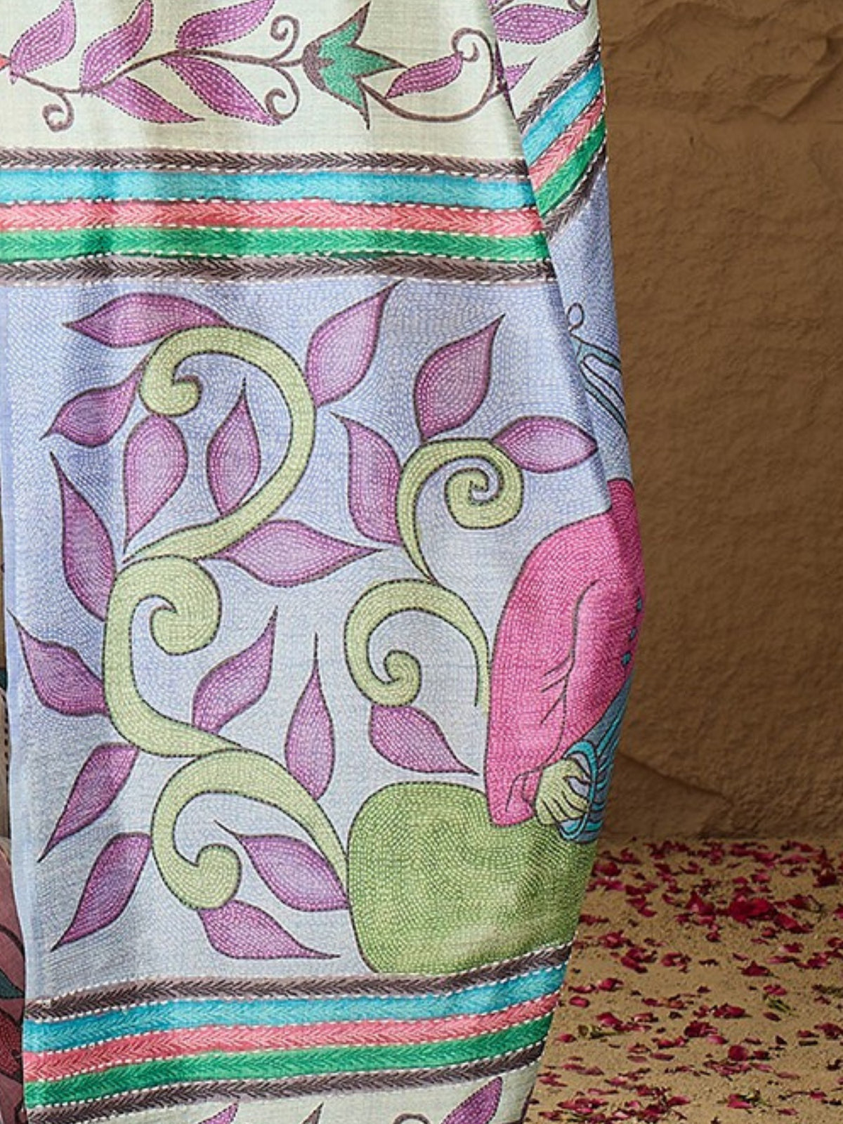 Pallu detail of multicolored art silk saree showing kalamkari narrative motif work and printed border