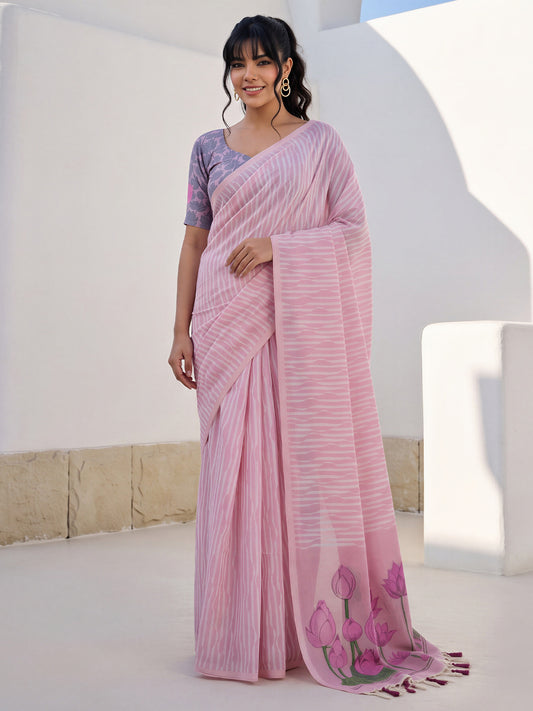 Woman wearing pink viscose saree with traditional indian motif work and pink blouse