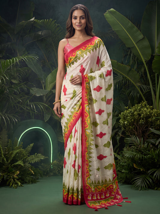 Woman wearing off white georgette saree with metallic foil print work and pink blouse
