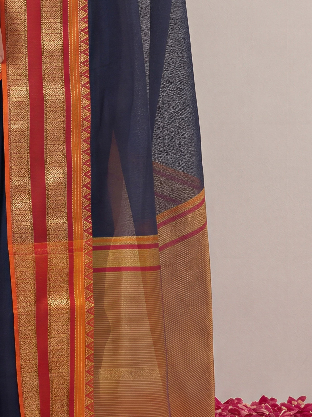 Pallu detail of black kota doria cotton saree showing clean solid-tone finish and zari border