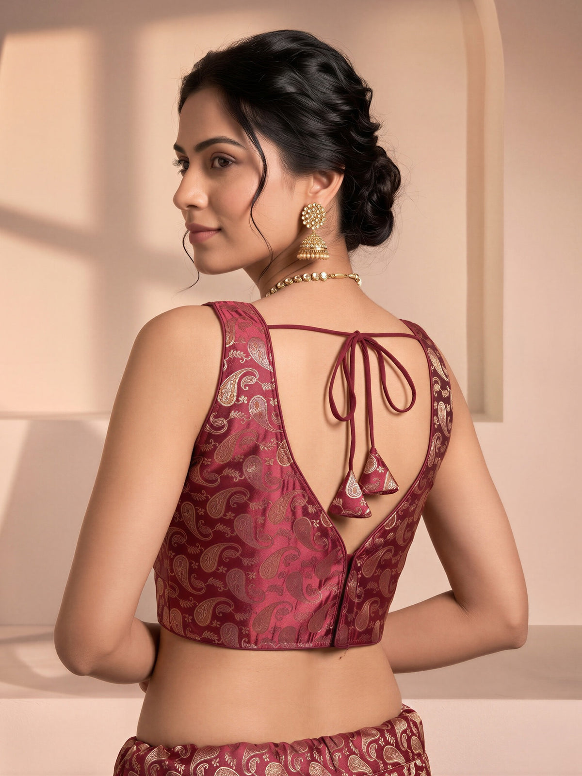 Maroon woven brocade silk blend sleeveless readymade saree blouse with v neck view 1