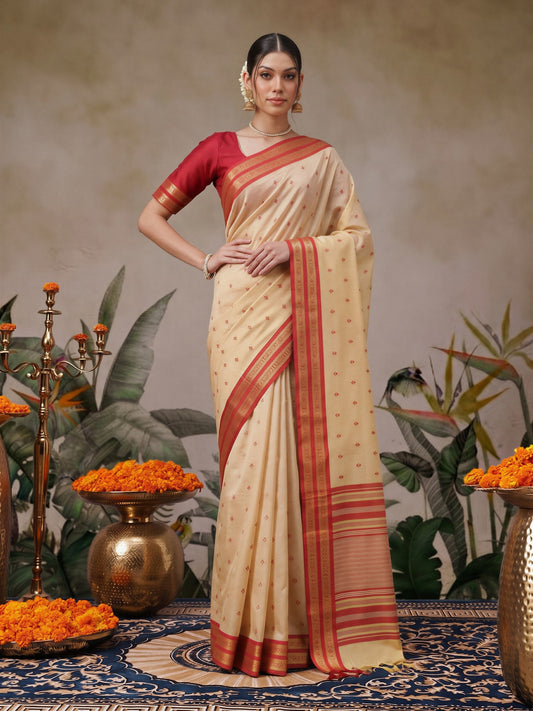 Cream woven design cotton blend saree with rust blouse piece