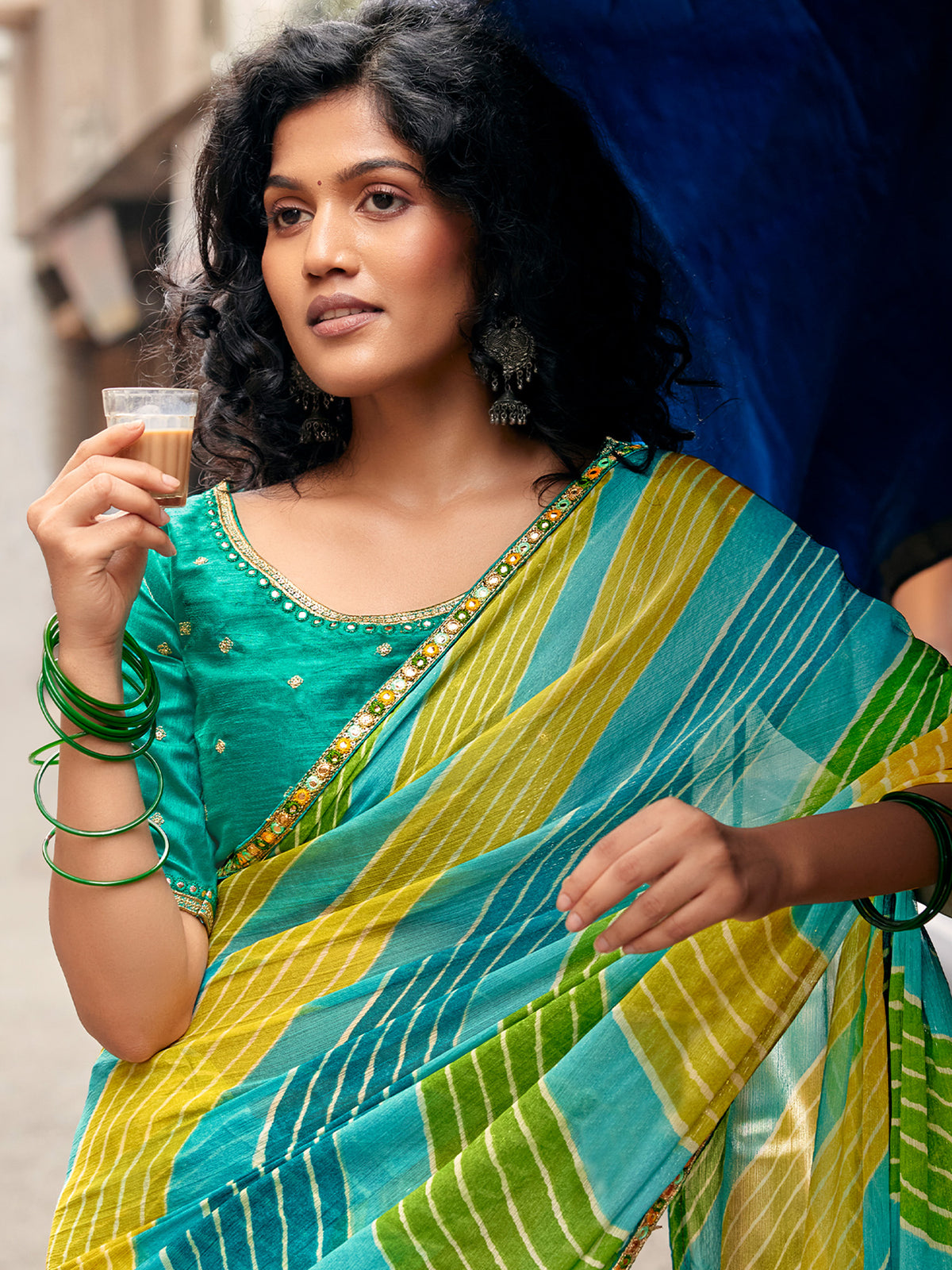Teal Green georgette saree view 1