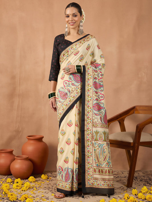 Woman wearing off white silk blend saree with metallic foil print work and black blouse