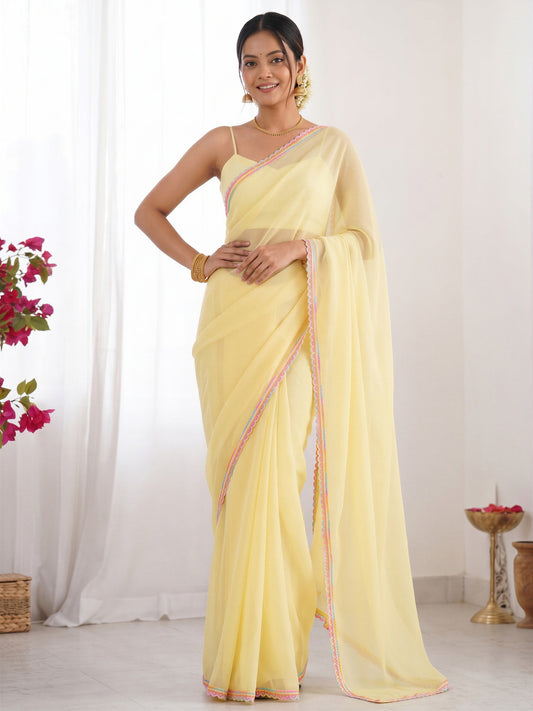 Yellow solid satin silk saree with yellow blouse piece