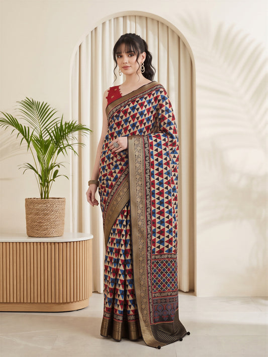 Woman wearing beige viscose silk saree with geometric pattern design and red blouse