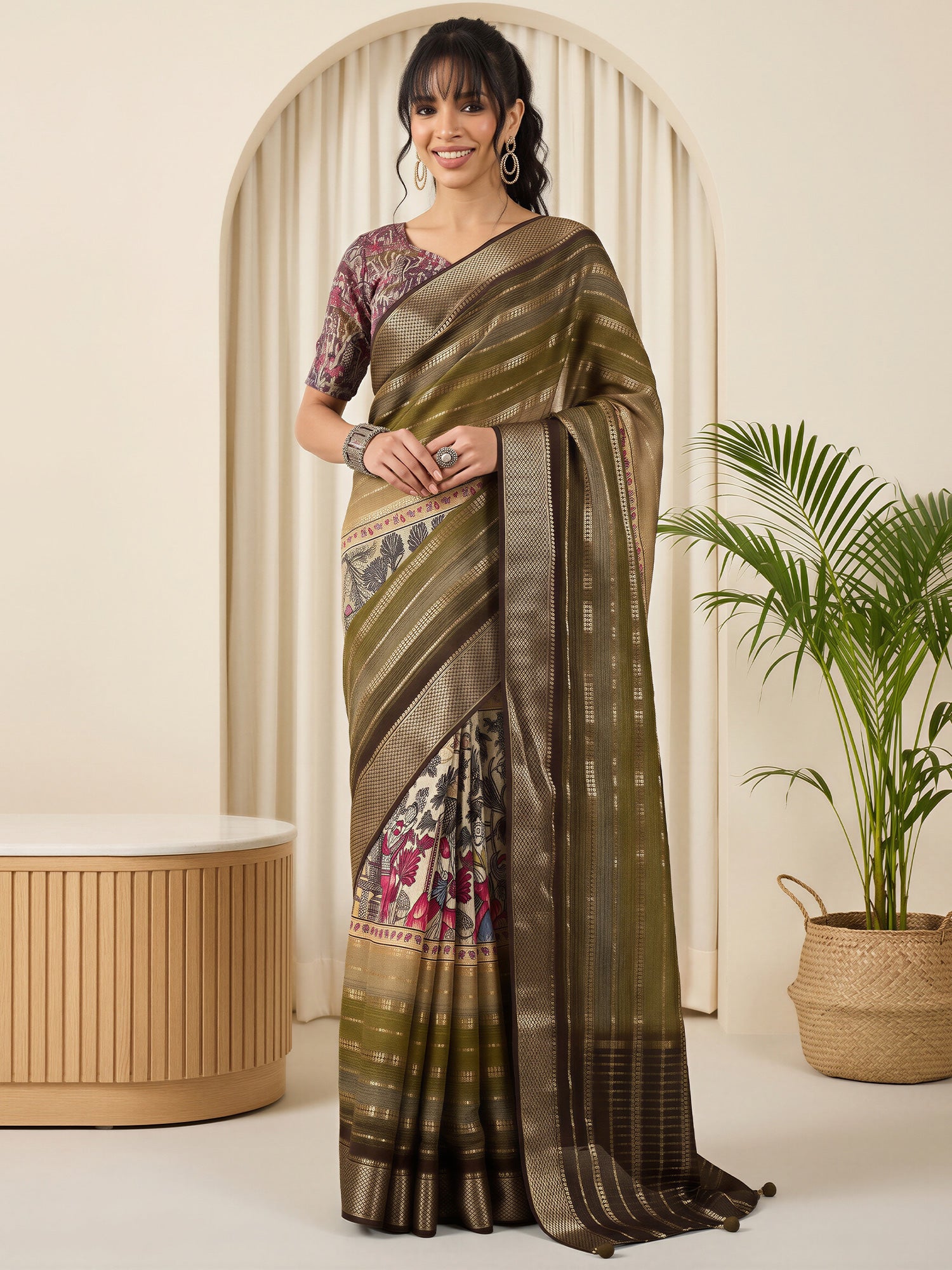Woman wearing olive viscose silk saree with traditional indian motif work and multicolored blouse