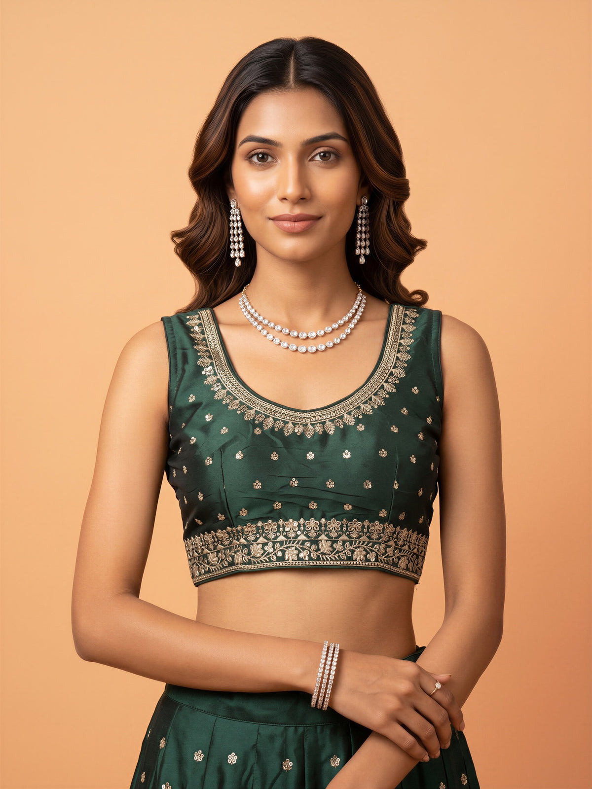 Green sequin embellished silk blend sleeveless readymade saree blouse with round neck
