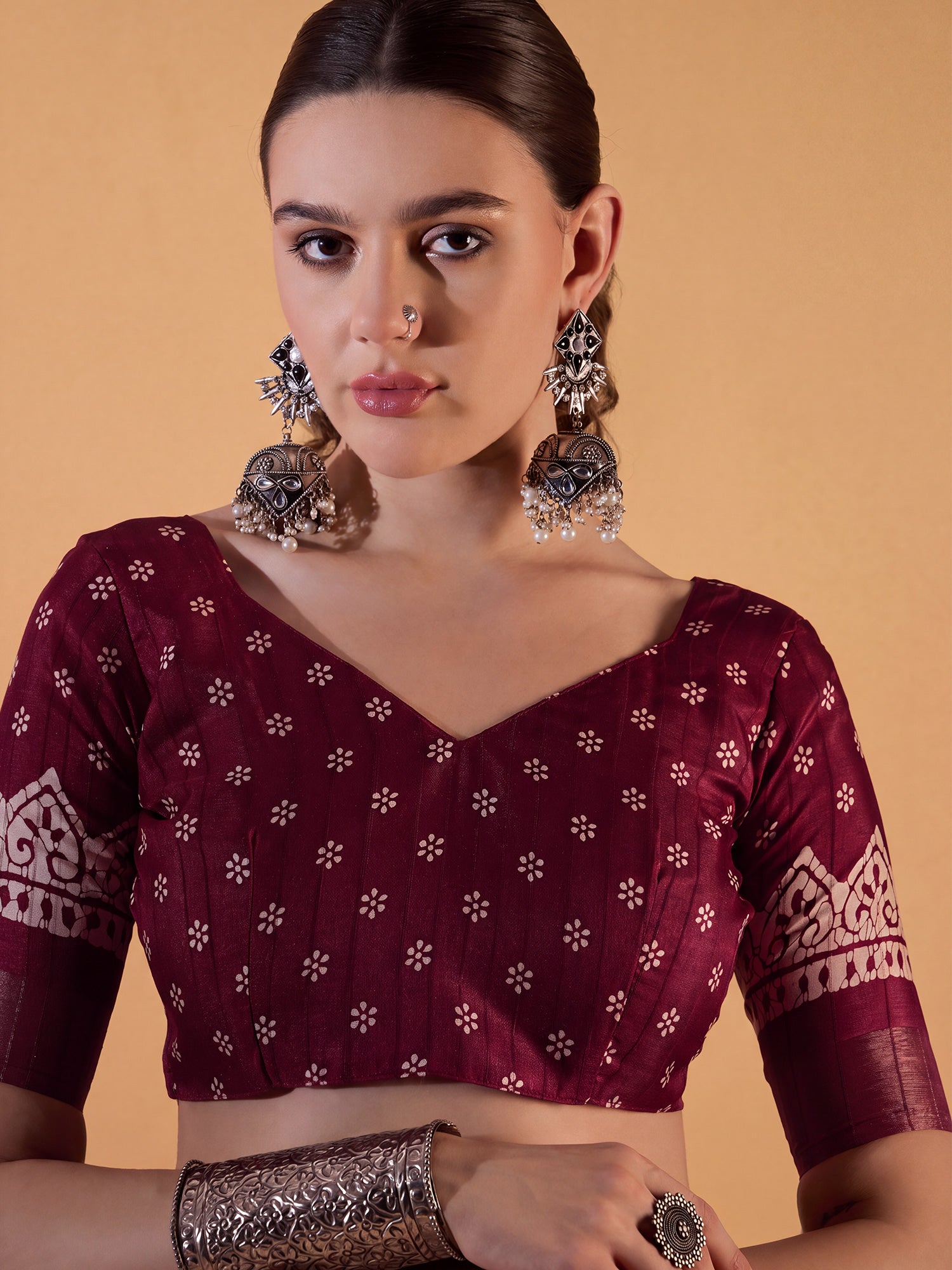 Unstitched burgundy silk blend blouse piece with ethnic motif design