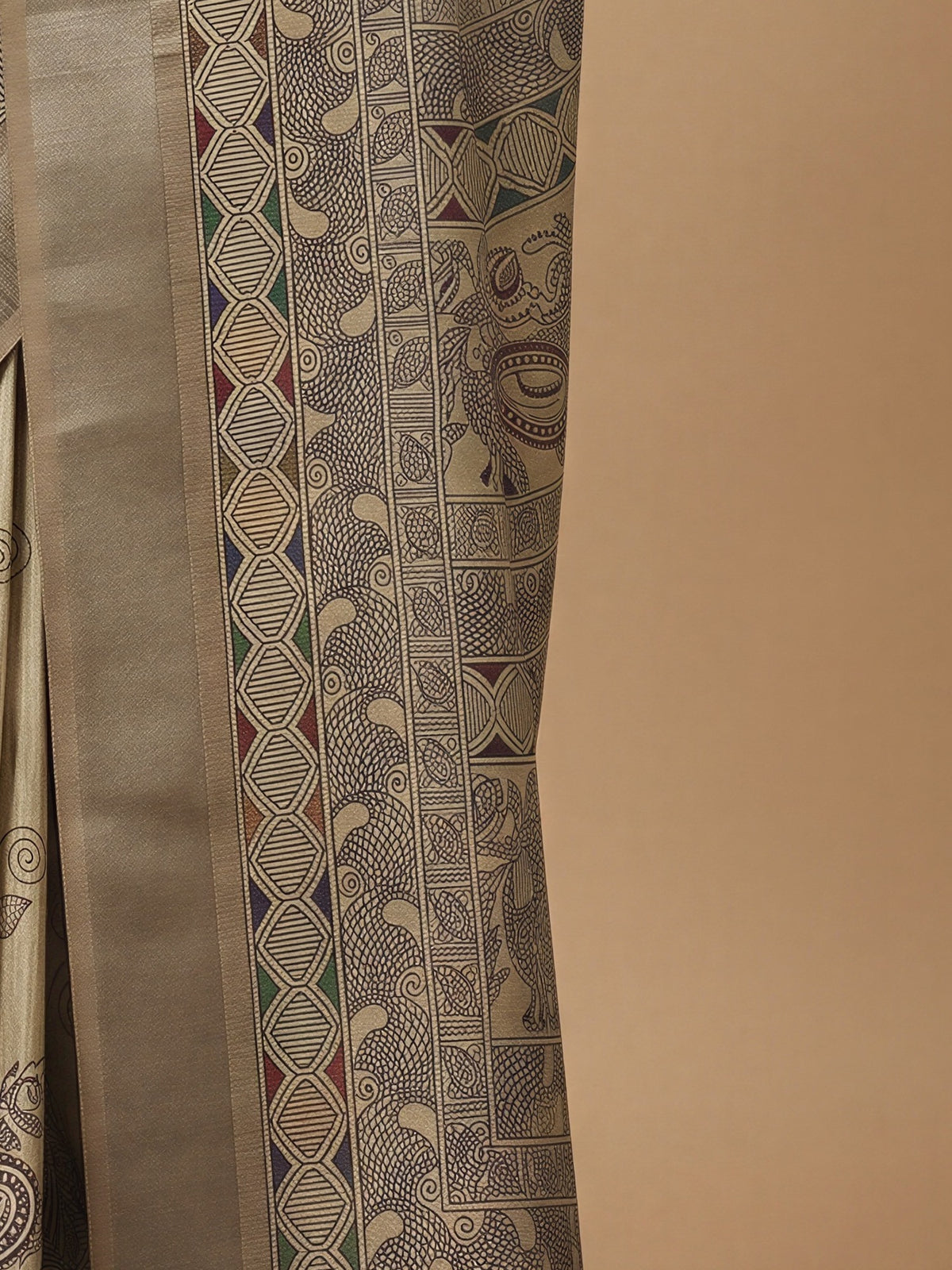 Pallu detail of cream satin silk saree showing hand block-printed motifs and zari border