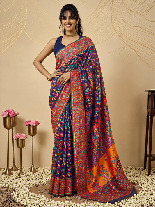 Woman wearing navy blue cotton silk saree with all-over floral design and navy blue blouse