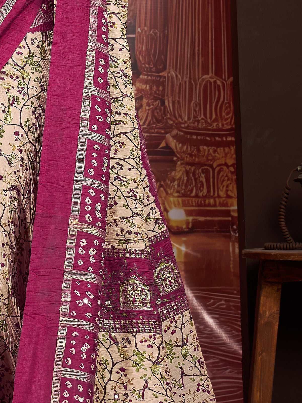Pallu detail of cream tussar silk saree showing traditional indian motif work and printed border