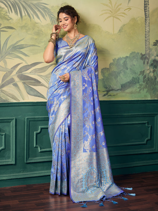 Woman wearing blue banarasi silk saree with woven motif design and blue blouse
