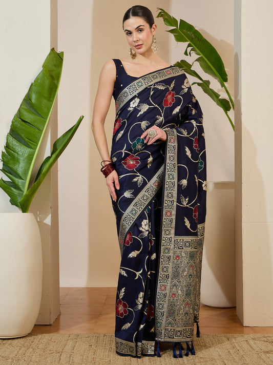 Woman wearing navy blue dola silk saree with all-over floral design and navy blue blouse