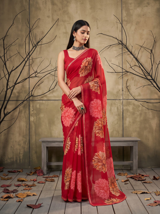 Woman wearing pink georgette saree with all-over floral design and pink blouse
