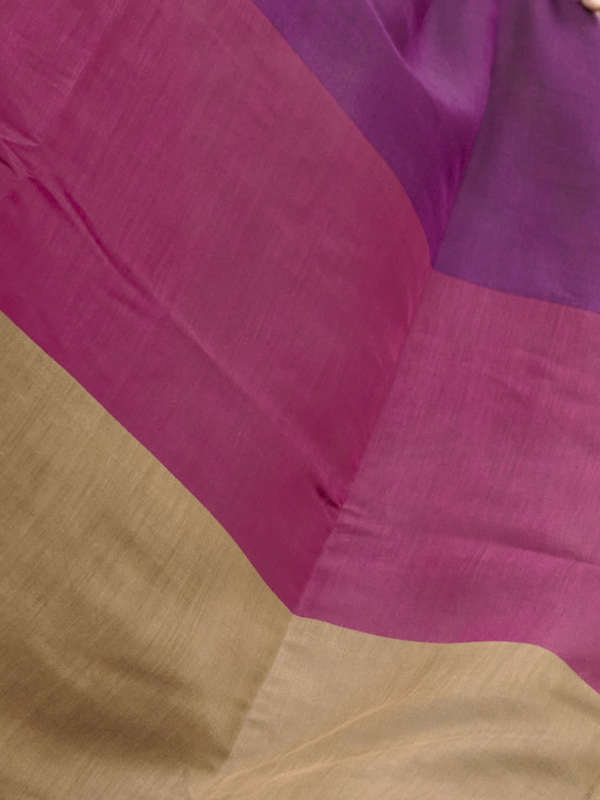 Pallu detail of wine cotton blend saree showing colorblocked design and zari border