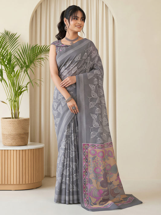 Woman wearing grey linen blend saree with all-over floral design and grey blouse
