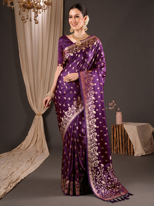 Woman wearing purple silk blend saree with zari butta (metallic motif) work and purple blouse