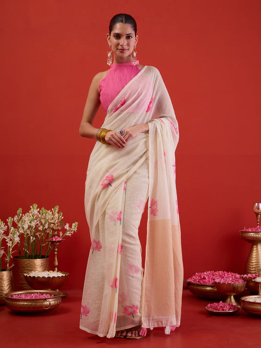 Woman wearing white chanderi cotton ready to wear saree with all-over floral design and pink blouse