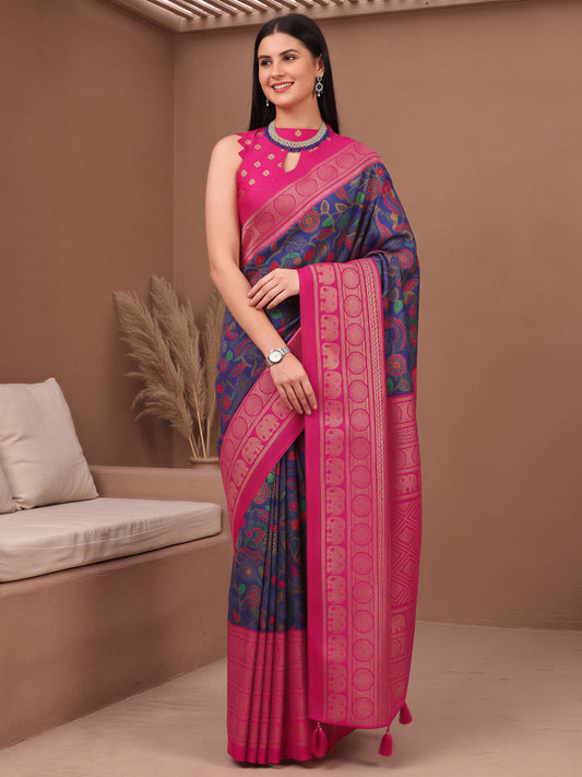 Woman wearing navy blue cotton blend saree with botanical floral and leaf design and pink blouse