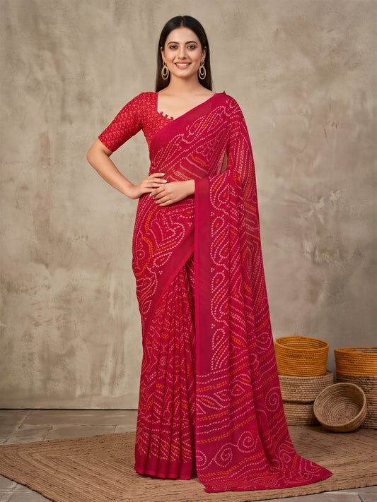 Woman wearing pink chiffon saree with bandhani tie-dye dot work and pink blouse