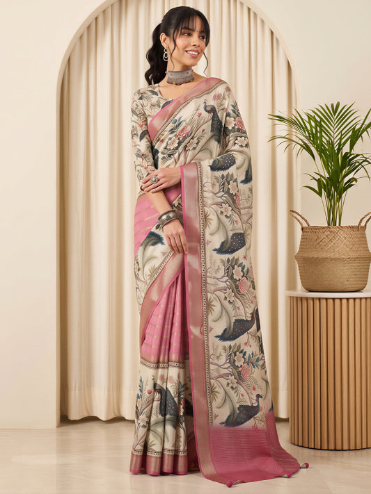 Woman wearing pink viscose silk saree with kalamkari narrative motif work and cream blouse